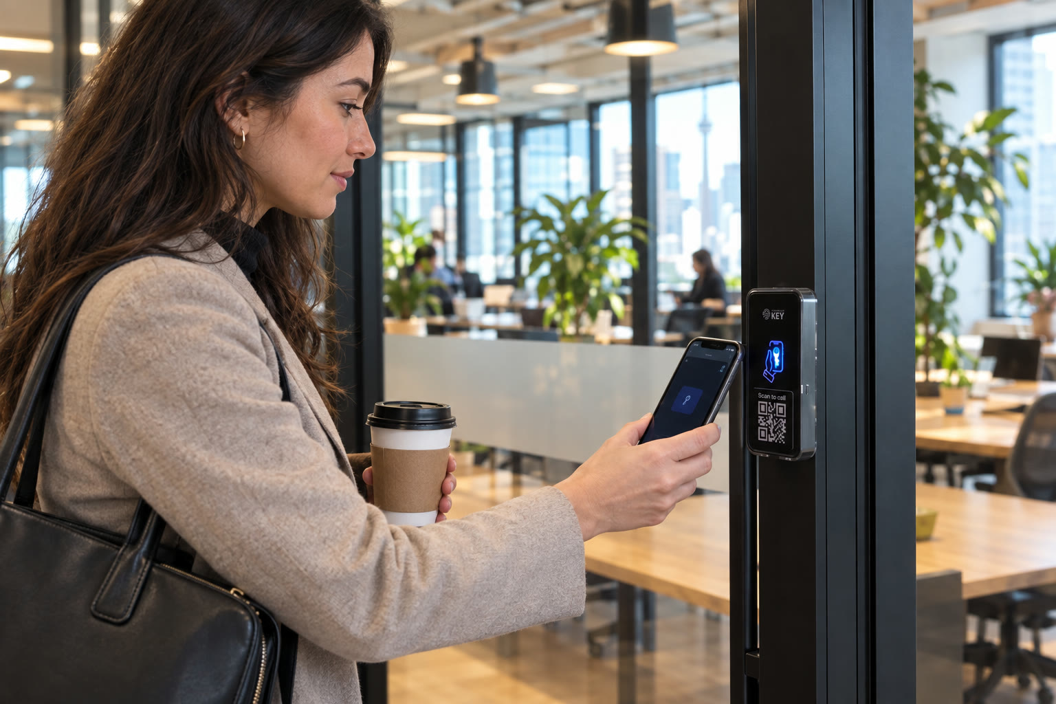 Illustrative office entry beside a glass door, where an uncredentialed visitor needs a way to contact someone inside.